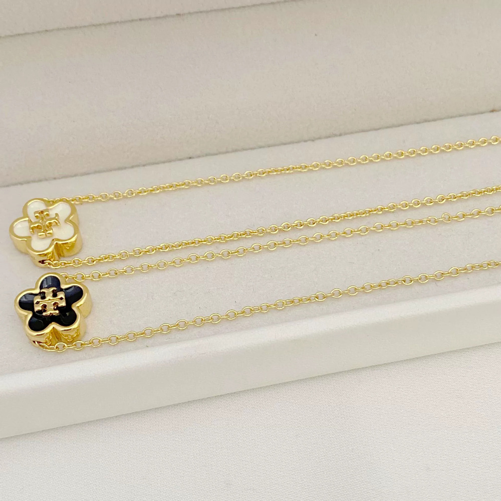 Tory Burch Natural Shell Flower Necklace